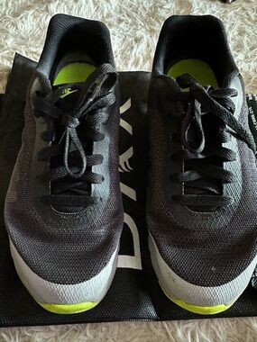 Nike Women’s Black Athletic Shoes with Lime Accents